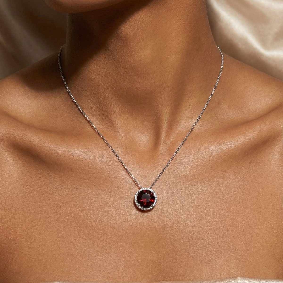 Studio-grade AI jewelry photo of the same Garnet halo pendant, generated by Aurix